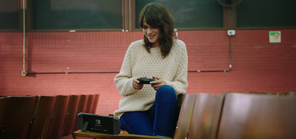 Woman playing Nintendo Switch